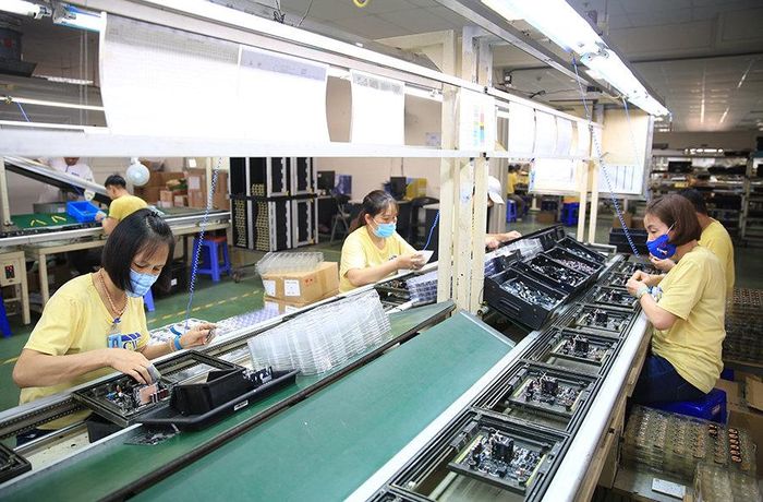 Sản xuất linh kiện điện tử tại Công ty TNHH Channel Well Technology Việt Nam (Khu công nghiệp Quang Minh, thành phố Hà Nội). Ảnh: Quang Thái