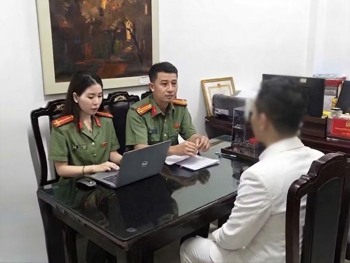 Cơ quan chức năng làm việc với T.Q.T