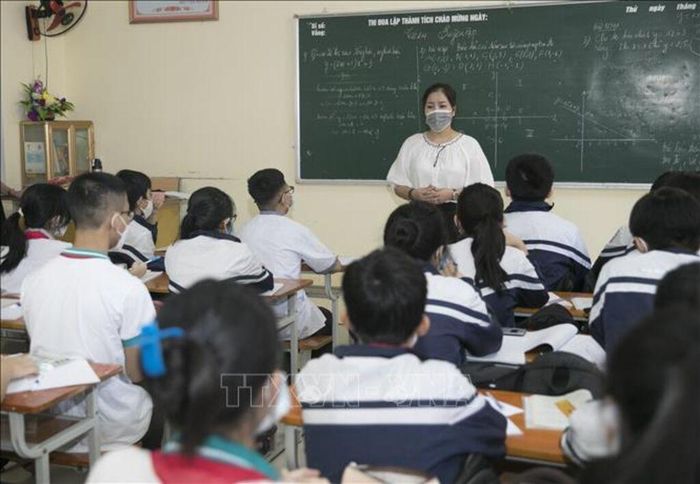 Giờ học của học sinh trường THCS Nghi Ân, thành phố Vinh, tỉnh Nghệ An. Ảnh tư liệu: TTXVN