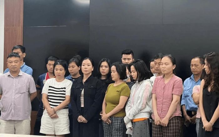 Mai Anh (áo khoác đen) và các đối tượng liên quan. Ảnh: Cơ quan công an cung cấp