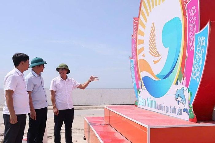 Hình ảnh logo được đặt tại địa điểm diễn ra lễ công bố. Ảnh: UBND Xã Giao Ninh.