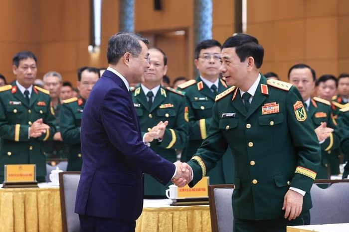 Thủ tướng Chính phủ Lê Minh Hưng và Đại tướng Phan Văn Giang, Ủy viên Bộ Chính trị, Phó Thủ tướng Chính phủ, Bộ trưởng Bộ Quốc phòng tại buổi lễ - Ảnh: VGP/Nhật Bắc