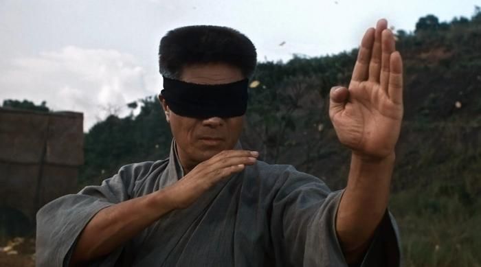 Vai diễn Trần Chân trong Tinh Võ Anh Hùng (1994) ghi dấu ấn sâu đậm nhờ những trận giao đấu đối kháng chân thực với tốc độ cao. Ảnh: NSX