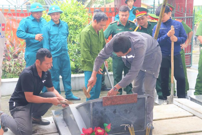 Động thổ lấy mẫu giám định ADN đối với liệt sĩ.