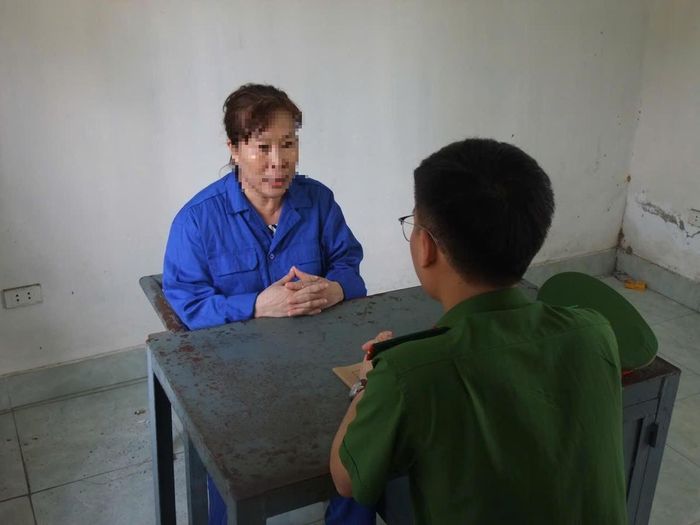 Cơ quan Cảnh sát điều tra Công an tỉnh Phú Thọ làm việc với đối tượng Đặng Thị Nga. Ảnh: Bộ Công an