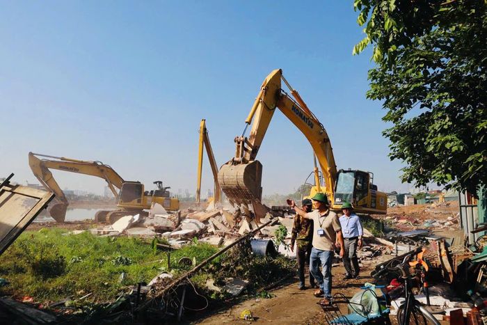 Công tác giải phóng mặt bằng hồ điều hòa Phú Đô hoàn thành xong trước thời hạn thành phố giao. Ảnh: PV
