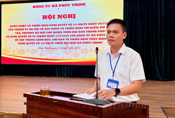 Chủ tịch UBND xã Nguyễn Văn Bằng trình bày Đề án xây dựng "xã xã hội chủ nghĩa". Ảnh: Thanh Hà