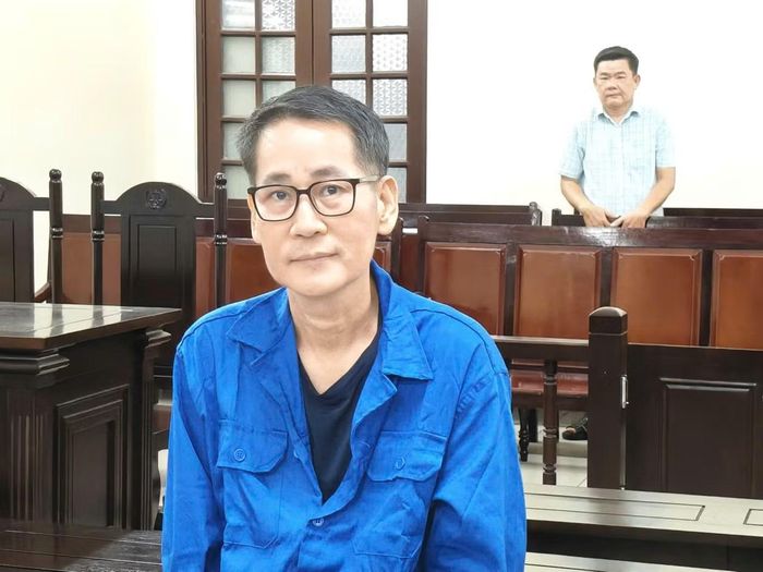 Bị cáo Nguyễn Lê Minh tại phiên tòa chiều 14/7.