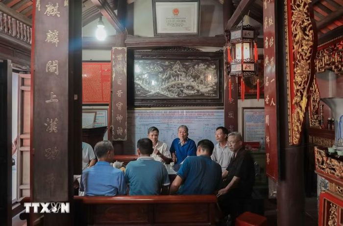 Nhà thờ Tiến sỹ Nguyễn Thực, di tích quốc gia, tự hào với truyền thống 8 vị tiến sỹ. Người dân hy vọng nơi đây trở thành điểm du lịch, giáo dục hiếu học tiêu biểu, góp phần phát triển kinh tế và xây dựng xã xã hội chủ nghĩa văn minh. (Ảnh: Phan Phương/TTXVN)