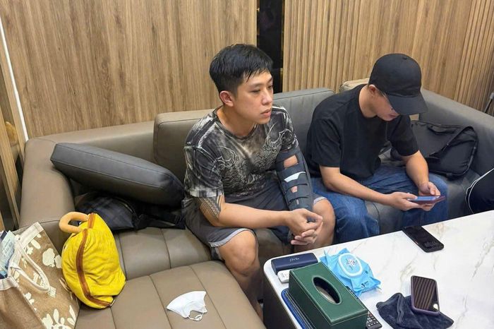 Đối tượng Vũ Quang Huy tại cơ quan công an. Ảnh: CACC.
