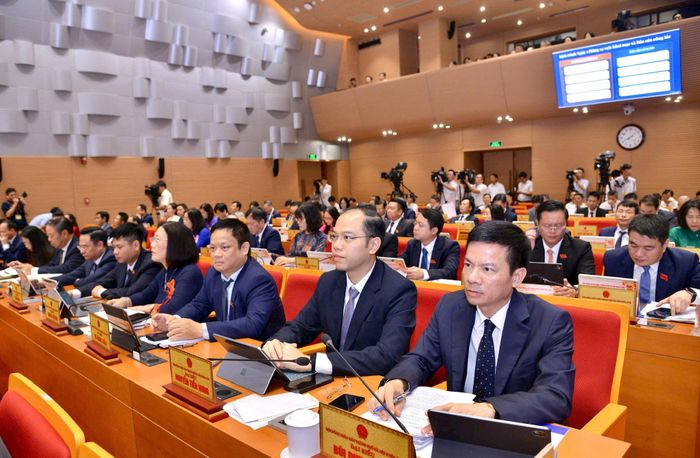 Các đại biểu HĐND thành phố Hà Nội tham dự kỳ họp. Ảnh Thành Thái