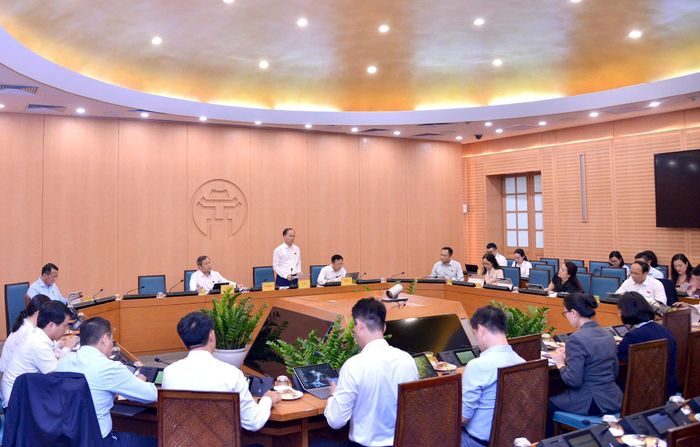 Các đại biểu HĐND thành phố Hà Nội thảo luận tại Tổ chiều 14-7. Ảnh: Viết Thành