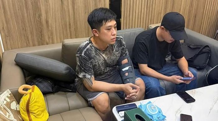 Vũ Quang Huy bị cảnh sát bắt giữ. Ảnh: Công an TP Hà Nội.