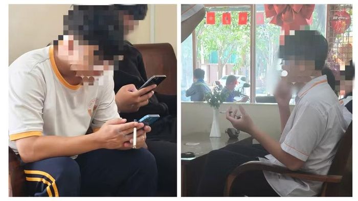 Học sinh mặc đồng phục hút thuốc lá tại một quán cà phê trước cổng trường học. (Ảnh: Thế Hùng)