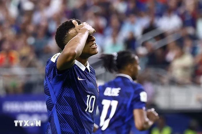 Mbappe và tuyển Pháp có ngày thi đấu đáng quên. (Ảnh: AFP/TTXVN)