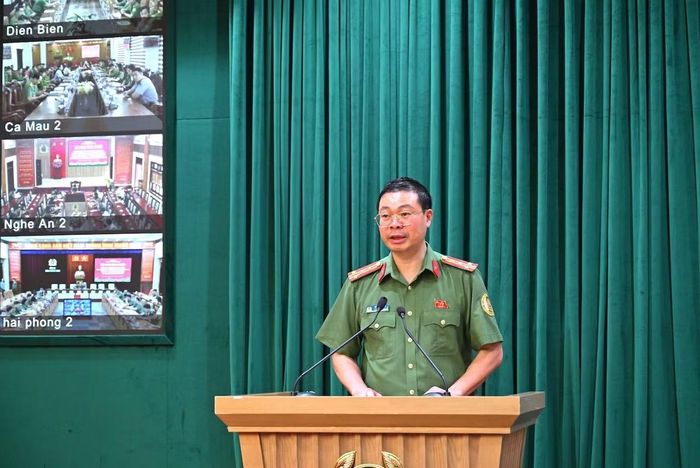 Đại tá Vũ Văn Quân, Phó cục trưởng Cục Quản lý xuất nhập cảnh, Bộ Công an phát biểu tại hội nghị.