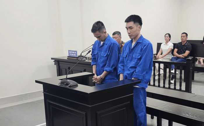 Hai bị cáo tại tòa. Ảnh: TN