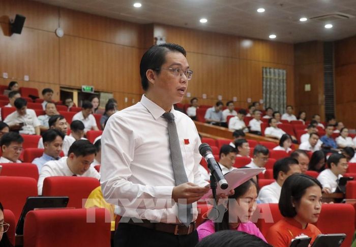 Các đại biểu thảo luận tại Kỳ họp. Ảnh: Thanh Thương- TTXVN 