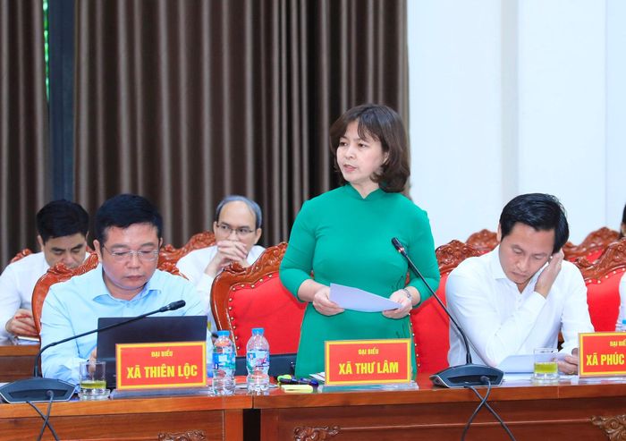 Đại diện lãnh đạo xã Thư Lâm báo cáo. Ảnh: Quang Thái
