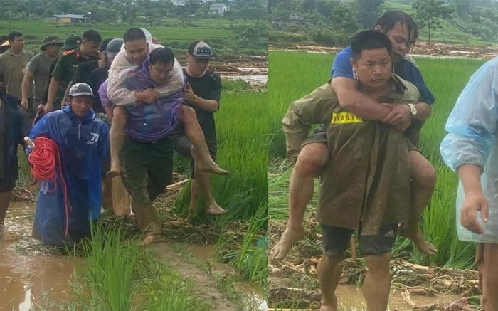 Công an xã Mường Than giải cứu thành công 2 người dân mắc kẹt giữa dòng lũ. (Nguồn: Công an Lai Châu)
