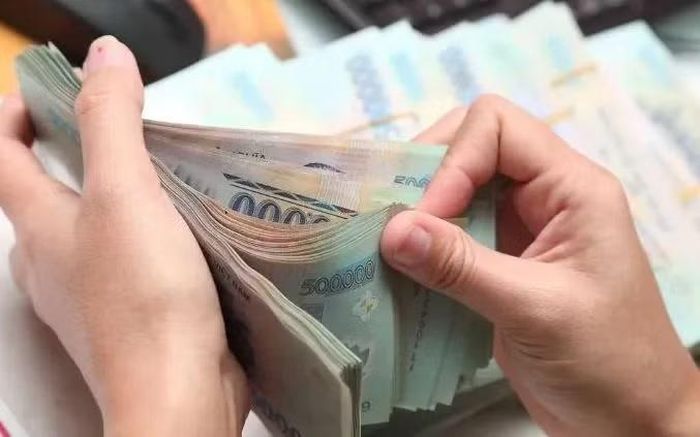 Trả lương thấp hơn mức lương tối thiểu, doanh nghiệp bị phạt đến 75 triệu đồng. Ảnh minh họa.
