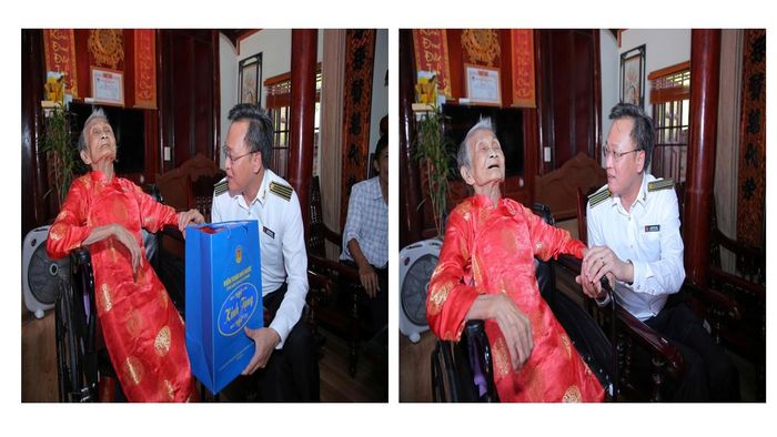 Tổng Kiểm toán nhà nước Nguyễn Hữu Nghĩa tặng quà Mẹ Việt Nam Anh hùng Phạm Thị Ý. Ảnh: Diệu Thiện