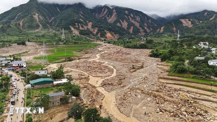 Bản Chít, xã Mường Than, tỉnh Lai Châu tan hoang sau cơn lũ dữ. (Ảnh: Quý Trung/TTXVN)