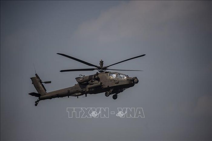 Trực thăng Apache AH-64 của quân đội Mỹ. Ảnh: AFP/TTXVN (không được phép khai thác, sử dụng bởi bên thứ ba)