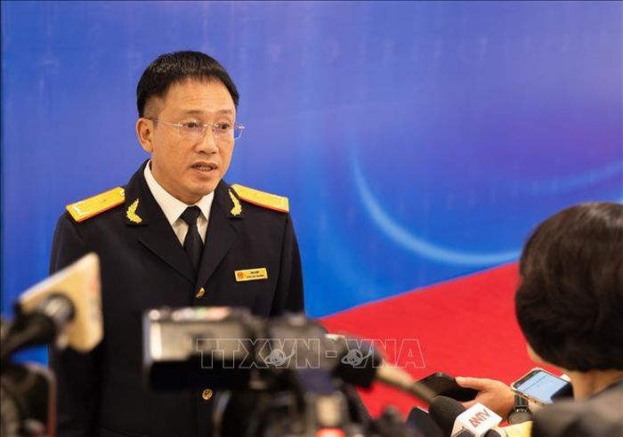 Phó cục trưởng Cục Thuế Mai Sơn trả lời phỏng vấn bên lề Hội nghị chiều 20/7. Ảnh: Tiến Long/TTXVN.