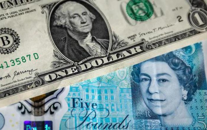 Ngân hàng niêm yết tỷ giá USD bán ra 26.490 đồng. (Ảnh minh họa).
