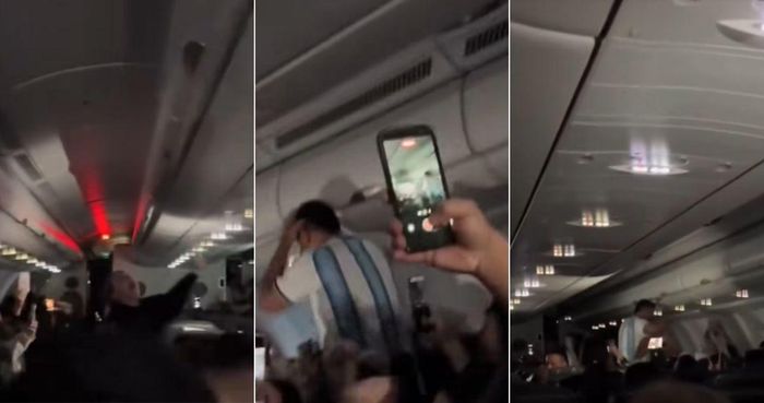 Hành khách Argentina vui sướng khi bị phi công lừa đội nhà vô địch. Ảnh cắt từ clip.