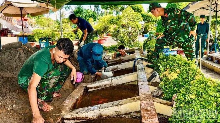 Các lực lượng làm nhiệm vụ tại Nghĩa trang Liệt sĩ Lai Vung-Lấp Vò (tỉnh Đồng Tháp).