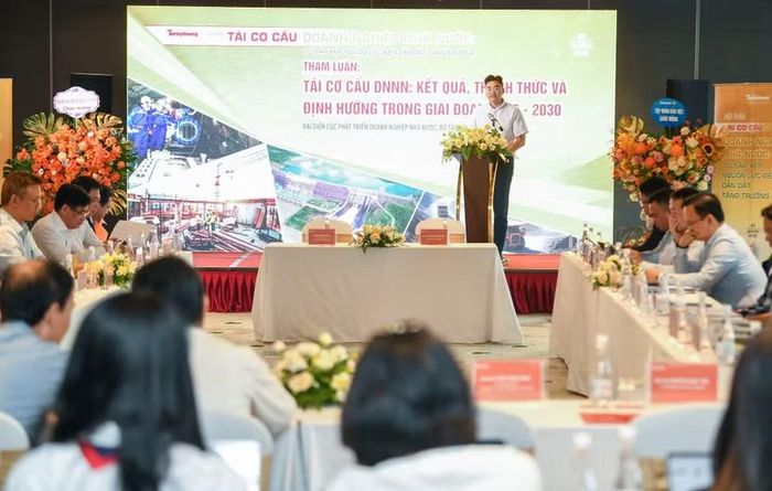 Hội thảo "Tái cơ cấu doanh nghiệp Nhà nước: Từ sắp xếp nguồn lực đến dẫn dắt tăng trưởng," ngày 21/7. (Ảnh: Vietnam+)