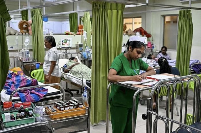  Bệnh nhân sốt xuất huyết điều trị tại Bệnh viện Đa khoa quận ở thành phố Negombo, Sri Lanka. (Ảnh: Getty Images)