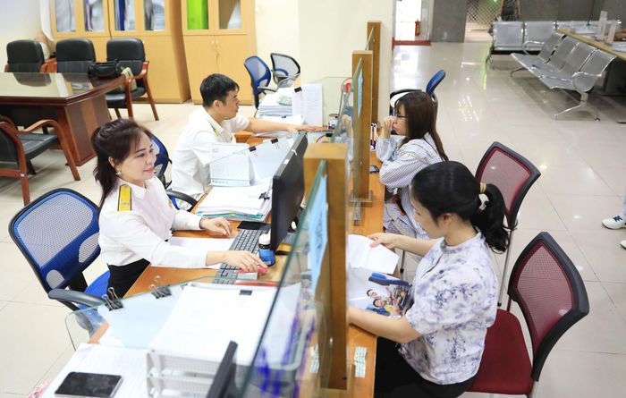 Giao dịch tại Thuế cơ sở 4 - Thành phố Hà Nội. Ảnh: Nguyễn Quang
