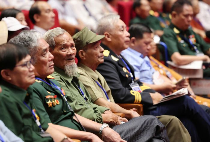  Các đại biểu là người có công với cách mạng tại hội nghị. Ảnh: QUANG PHÚC 