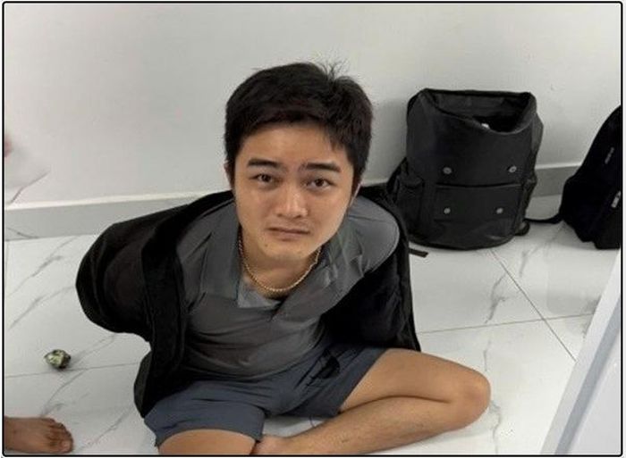 Đối tượng Sang khi bị bắt. Ảnh: CACC