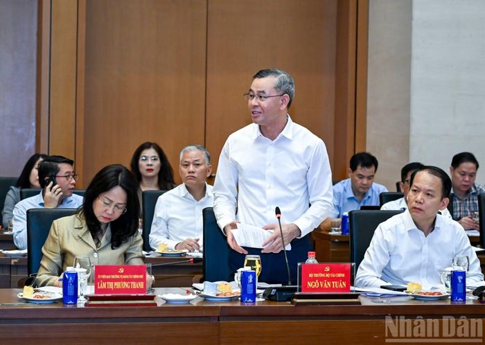 Bộ trưởng Tài chính Ngô Văn Tuấn phát biểu tại hội nghị. (Ảnh: DUY LINH)