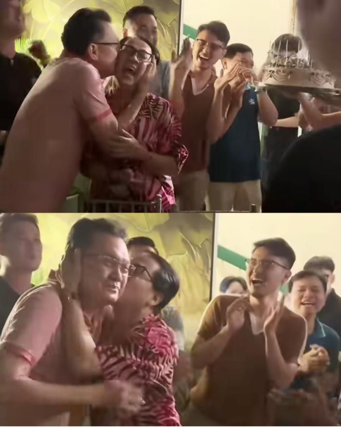 NSƯT Hữu Châu và NSƯT Thành Lộc trao cho nhau nụ hôn hạnh phúc tại buổi sinh nhật bất ngờ. Ảnh: Ngũ Long Du Ký