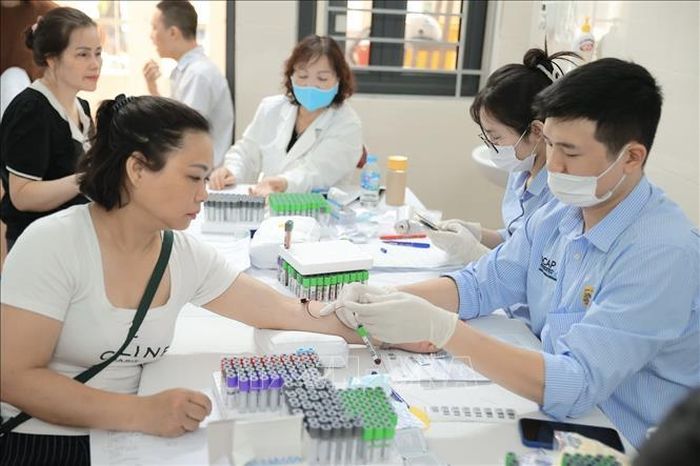 Chương trình góp phần nâng cao chất lượng chăm sóc sức khỏe ban đầu cho người dân theo định hướng chuyển từ “chữa bệnh” sang “chủ động phòng bệnh” theo tinh thần Nghị quyết 72 của Bộ Chính trị về một số giải pháp đột phá, tăng cường bảo vệ, chăm sóc và nâng cao sức khỏe cho nhân dân. Ảnh: Minh Quyết/TTXVN
