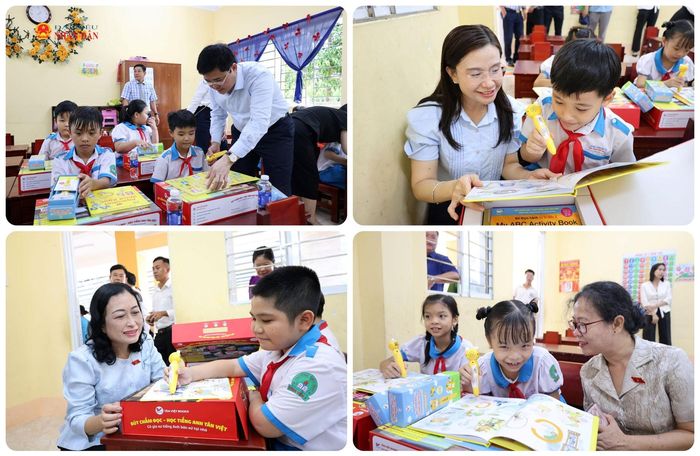 Các đại biểu hướng dẫn các em học sinh sử dụng bộ sách học tiếng Anh