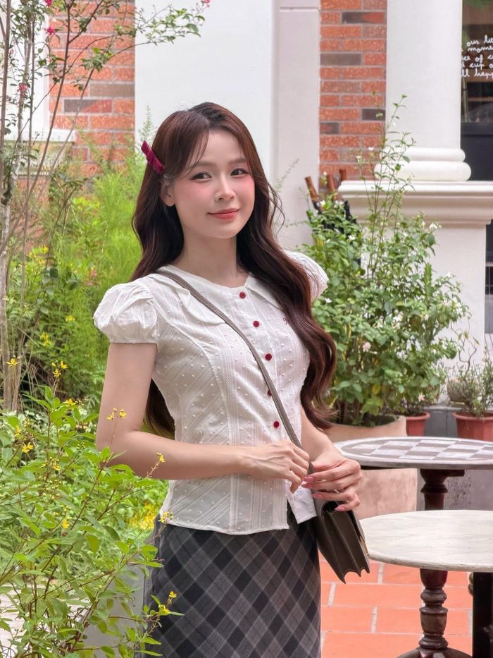 Sam giữ phong độ nhan sắc sau khi làm mẹ hai con. (Ảnh: FBNV)