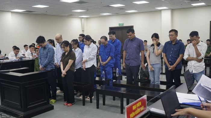 Các bị cáo tại phiên tòa ngày 27/7. Ảnh: Như Nguyệt.