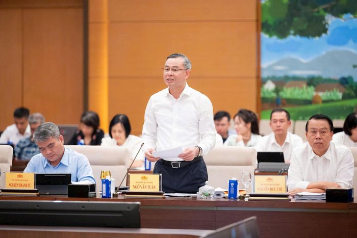 Bộ trưởng Bộ Tài chính Ngô Văn Tuấn trình bày nội dung cơ bản của dự thảo Luật. Ảnh: media.quochoi.vn