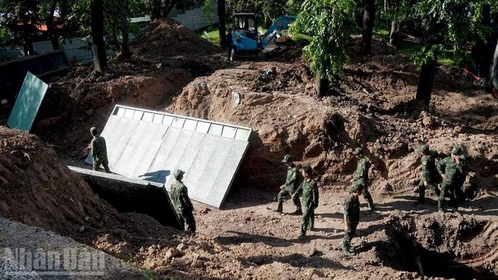 Đội quy tập hài cốt liệt sĩ thuộc Bộ Tư lệnh Thành phố Hồ Chí Minh làm nhiệm vụ.