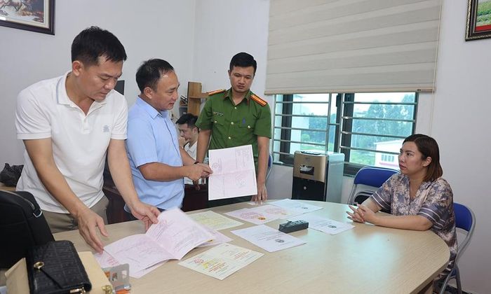 Ban chuyên án khám xét tại trụ sở Công ty Cổ phần Đầu tư và Dịch vụ Quốc tế Minh An.
