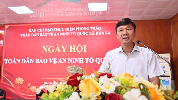 Bí thư Đảng ủy, Chủ tịch HĐND xã Hòa Xá Nguyễn Văn Định phát biểu tại Ngày hội Toàn dân bảo vệ an ninh Tổ quốc năm 2026. Ảnh: Thanh Hằng