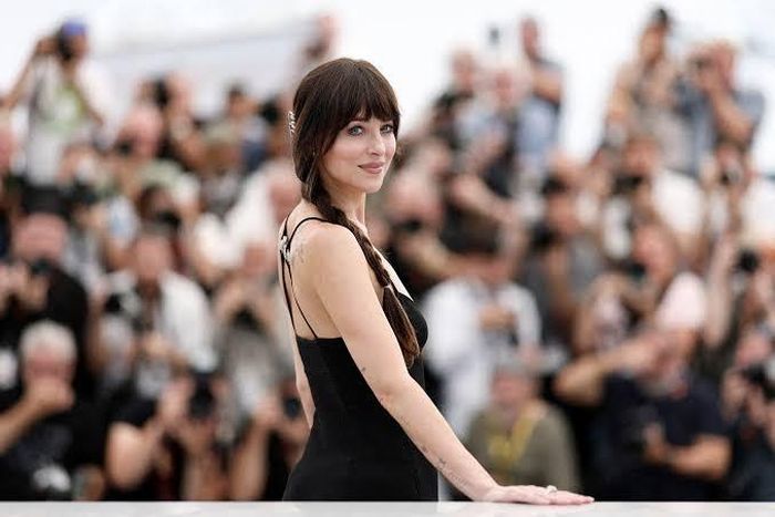  Dakota Johnson kín tiếng sau khi chia tay Chris Martin. Ảnh: Reuters. 