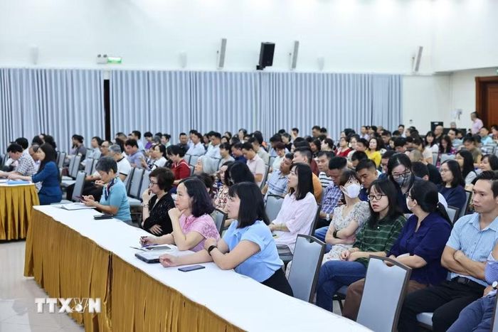 Cán bộ, đảng viên Đảng bộ Thông tấn xã Việt Nam dự hội nghị trực tuyến tại điểm cầu Trụ sở cơ quan Thông tấn quốc gia (Hà Nội). (Ảnh: Minh Đức/TTXVN)