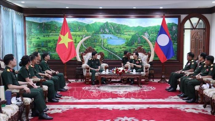Quang cảnh buổi làm việc giữa Đoàn công tác Học viện Quân y Việt Nam và Lãnh đạo Bộ Quốc phòng Lào. Ảnh: Xuân Tú/PV TTXVN tại Lào